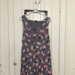 Purple floral knee length dress.